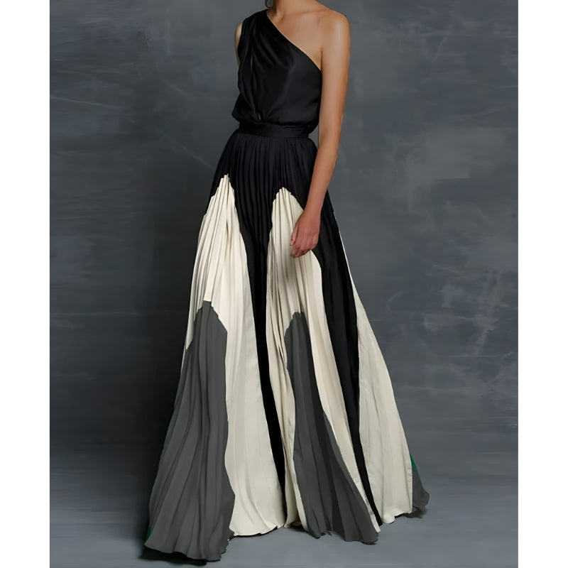 Avondjurk met asymmetrische schouderlijn en plissé rok