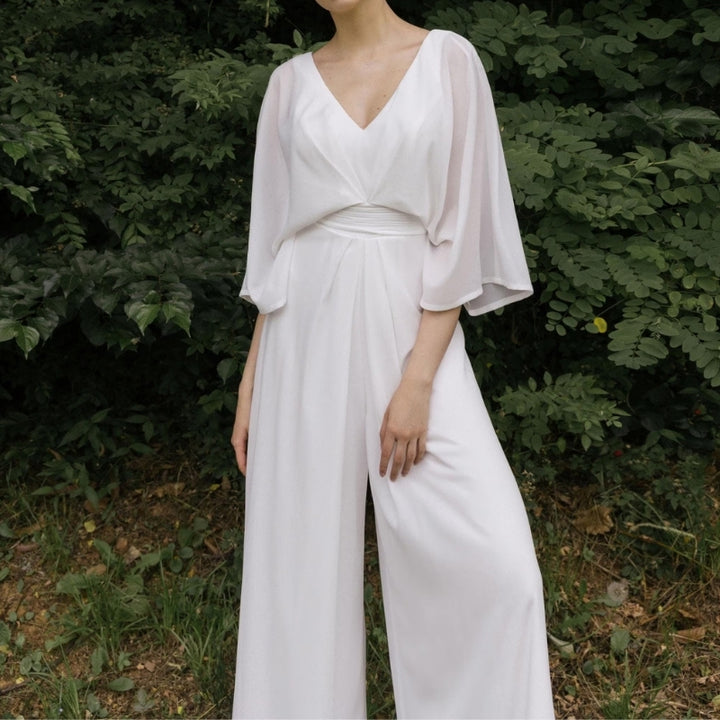 Broekpak met vleermuismouwen en wijde pijpen