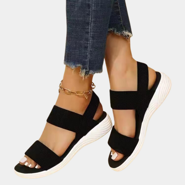 Dames platte sandalen met verstelbare band en comfortabele zool