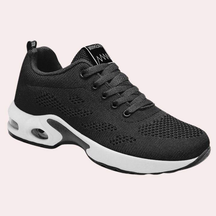 Dames sneakers met ademende afwerking en sportieve zool