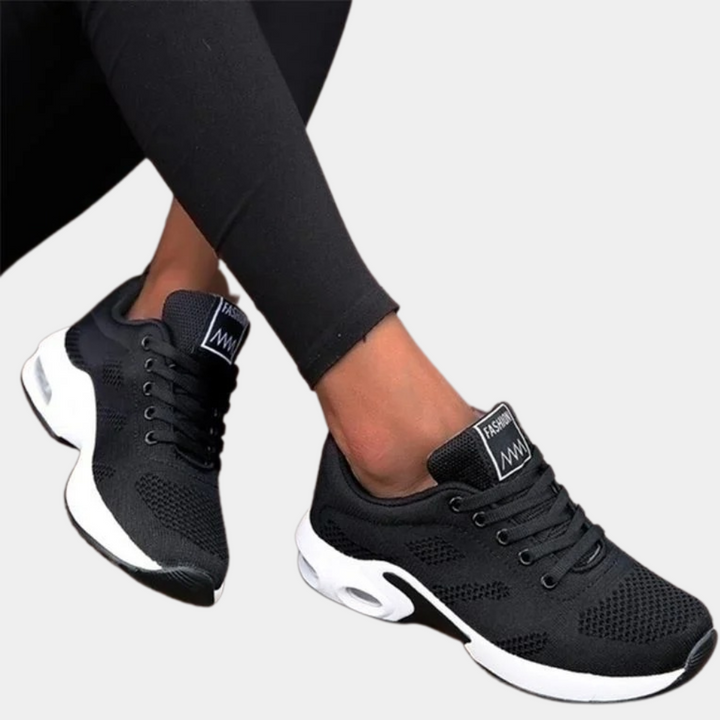 Dames sneakers met ademende afwerking en sportieve zool