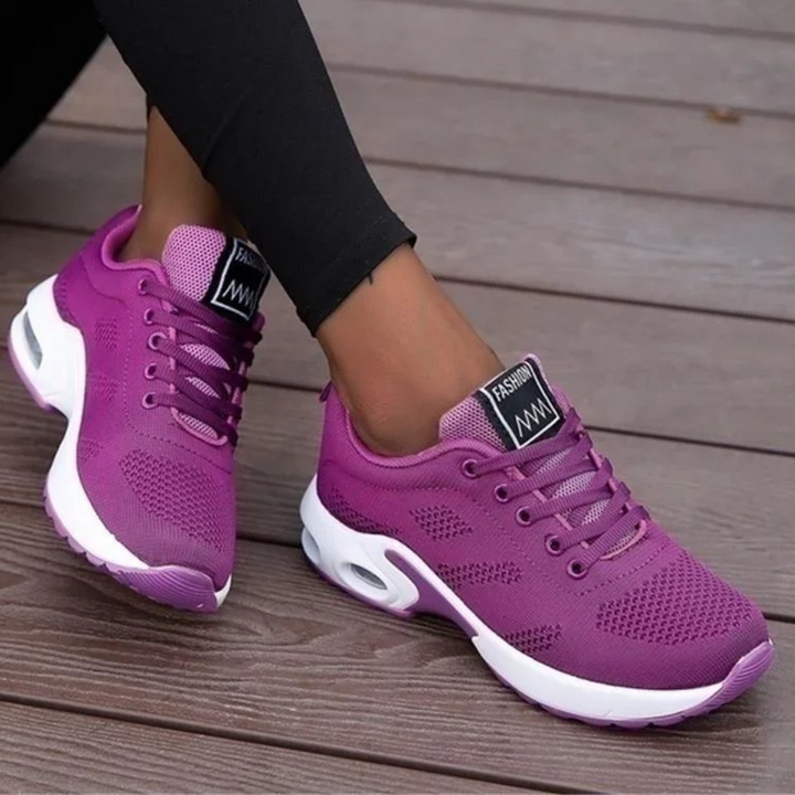 Dames sneakers met ademende afwerking en sportieve zool