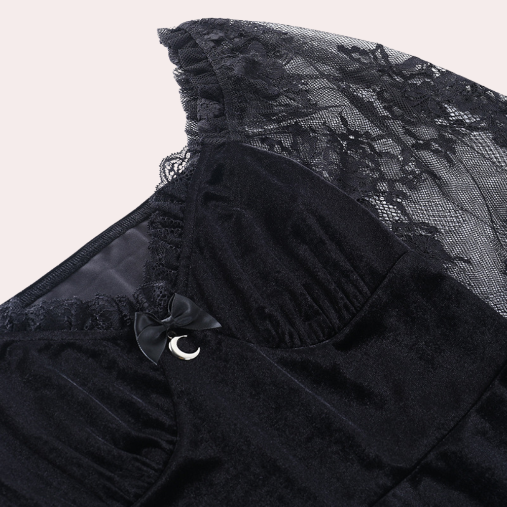 Dames jurk met kanten mouwen en trompetdetails