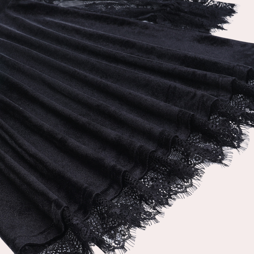 Dames jurk met kanten mouwen en trompetdetails