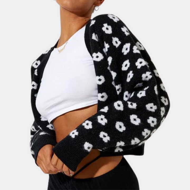 Dames gebreid vest met madeliefjesmotief en V-hals