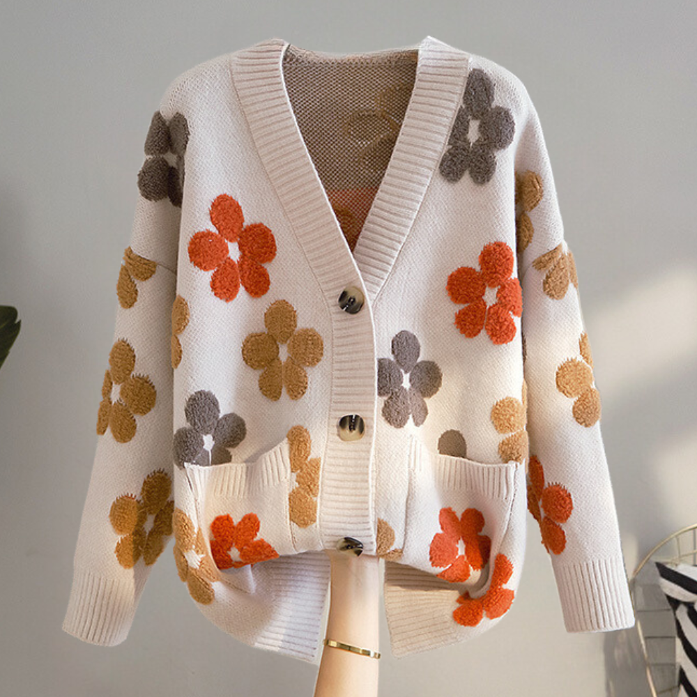 Dames vest met bloemenmotief en lange mouwen