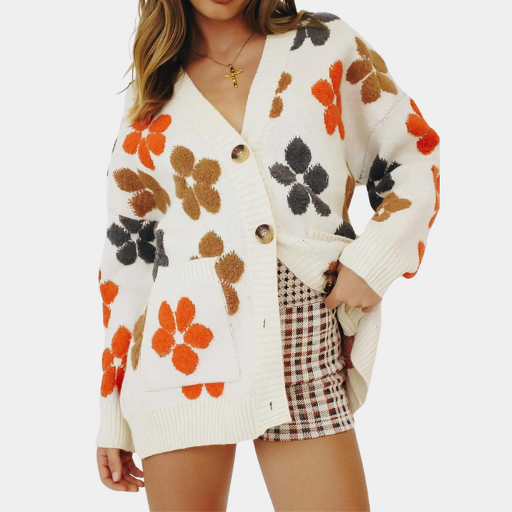 Dames vest met bloemenmotief en lange mouwen