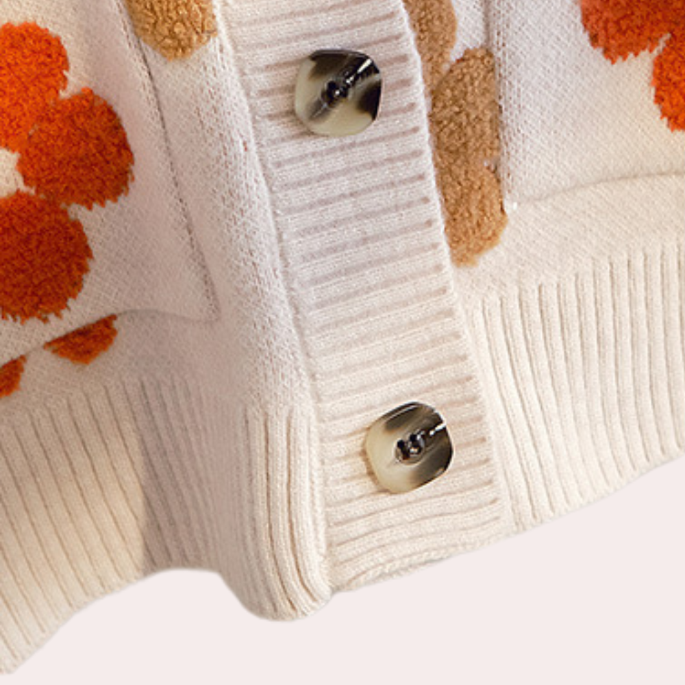 Dames vest met bloemenmotief en lange mouwen