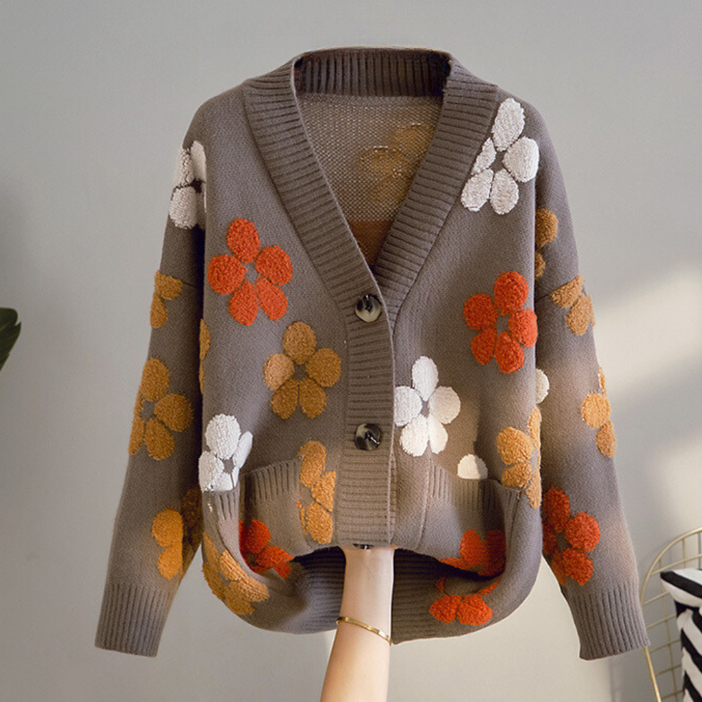 Dames vest met bloemenmotief en lange mouwen