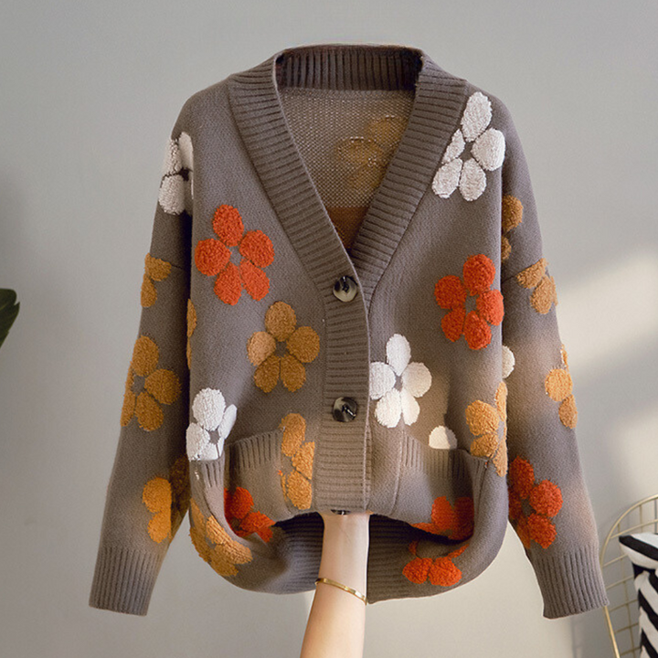 Dames vest met bloemenmotief en lange mouwen