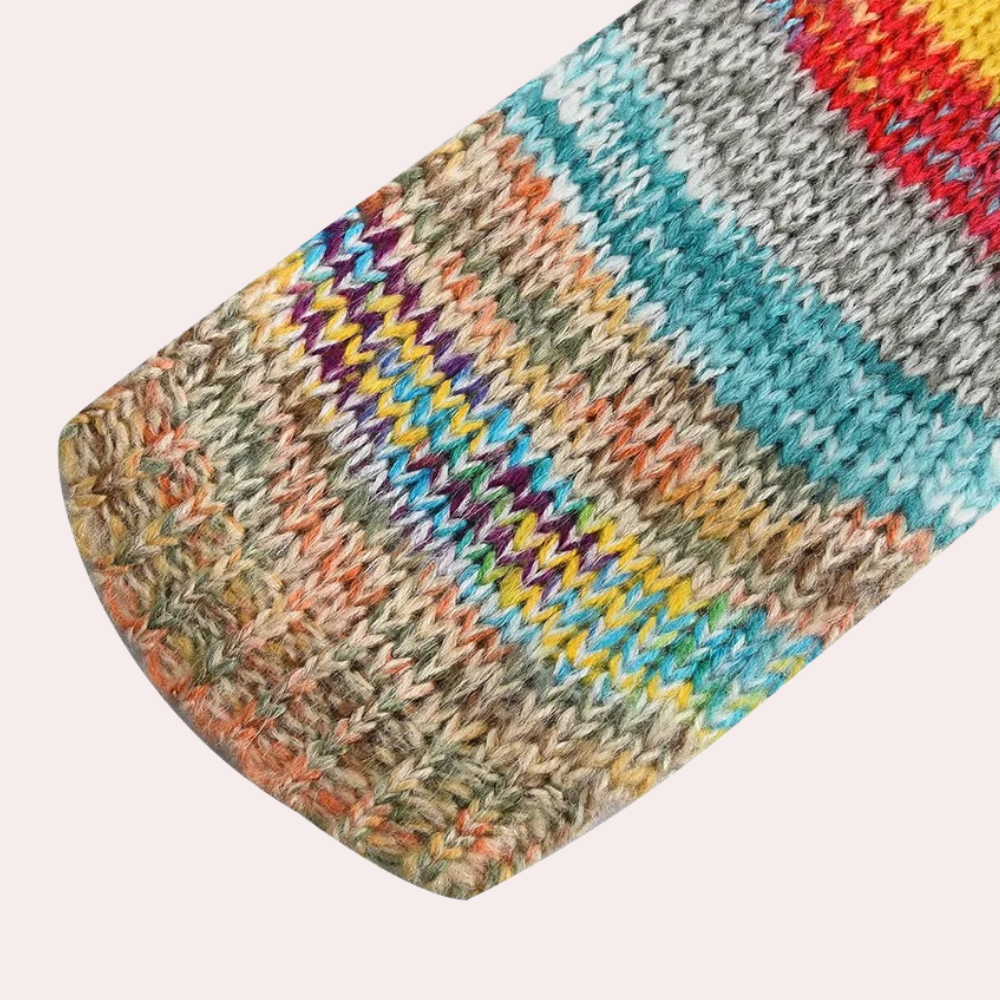 Dames gebreid vest met V-hals en meerkleurig patroon