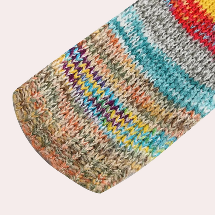 Dames gebreid vest met V-hals en meerkleurig patroon