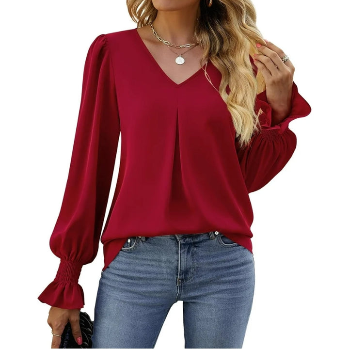 Damesblouse met V-hals en geplooide manchetten