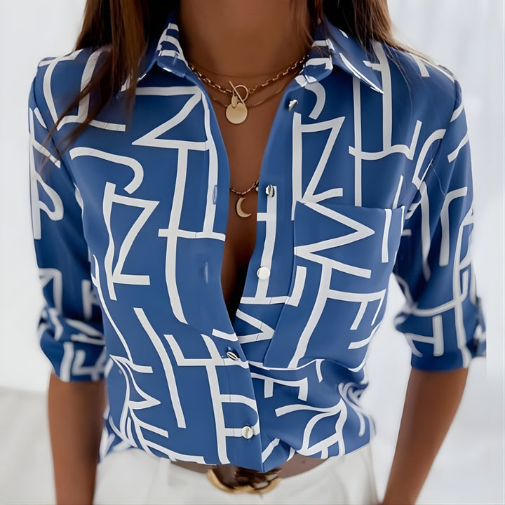 Damesblouse met abstracteprint en knoopsluiting