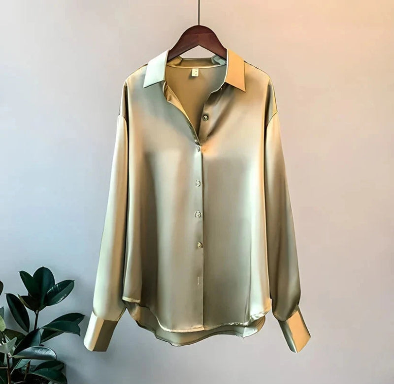 Damesblouse met lange mouwen puntkraag en knoopsluiting