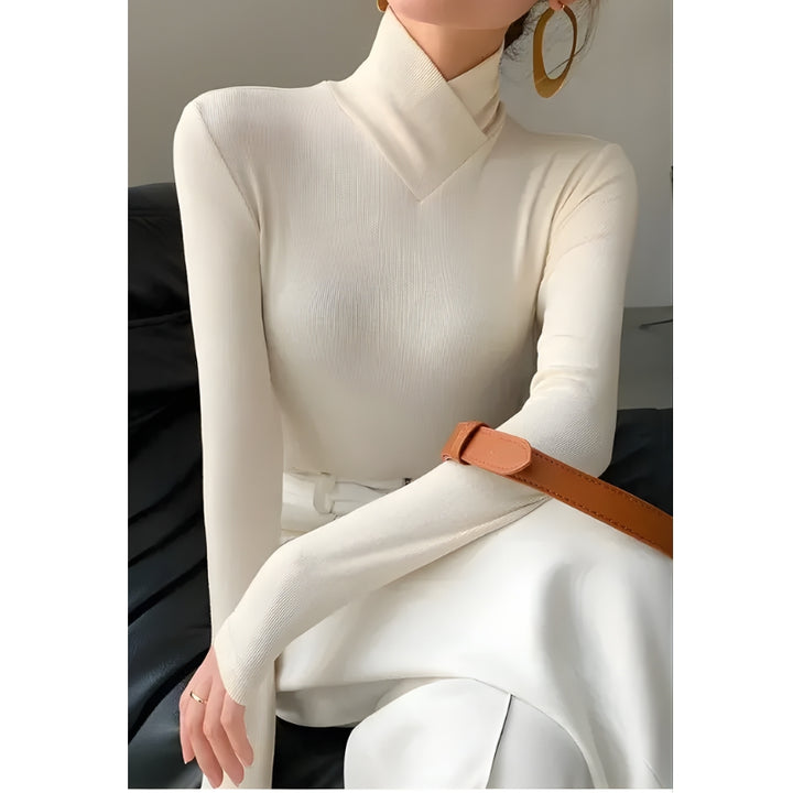 Damescoltrui met ribboord en horizontale naad op de borst