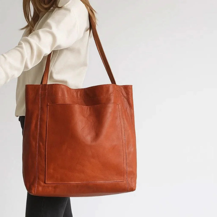 Dames draagtas met schouderbanden en voorvak met rits