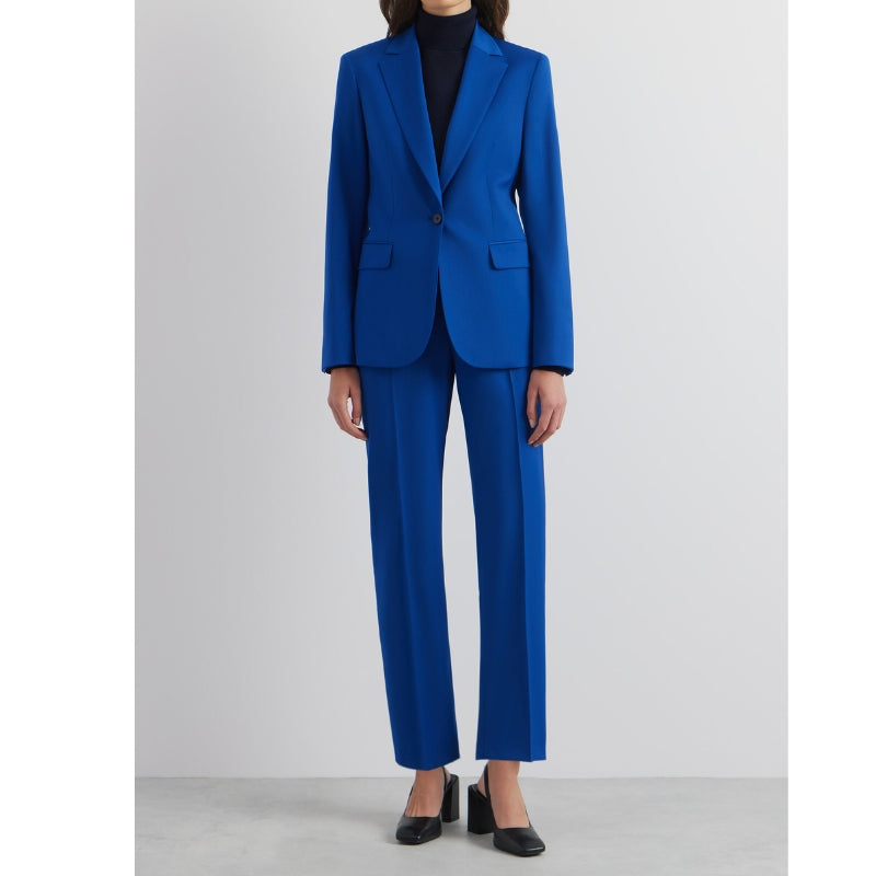 Damespak met enkelvoudige knoopsluiting en wijde pijpen