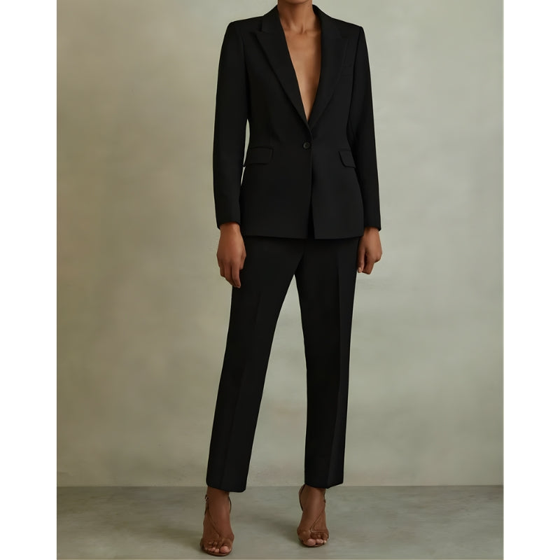 Damespak met enkelvoudige knoopsluiting en wijde pijpen