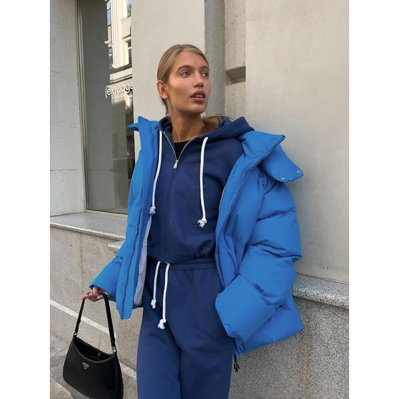 Dames pufferjas oversized met capuchon en rits