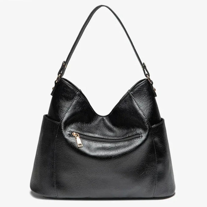 Dames schoudertas met ritsvakken en afneembare band