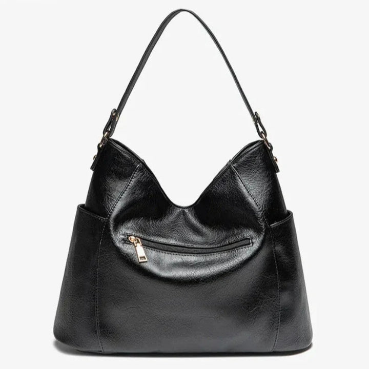 Dames schoudertas met ritsvakken en afneembare band