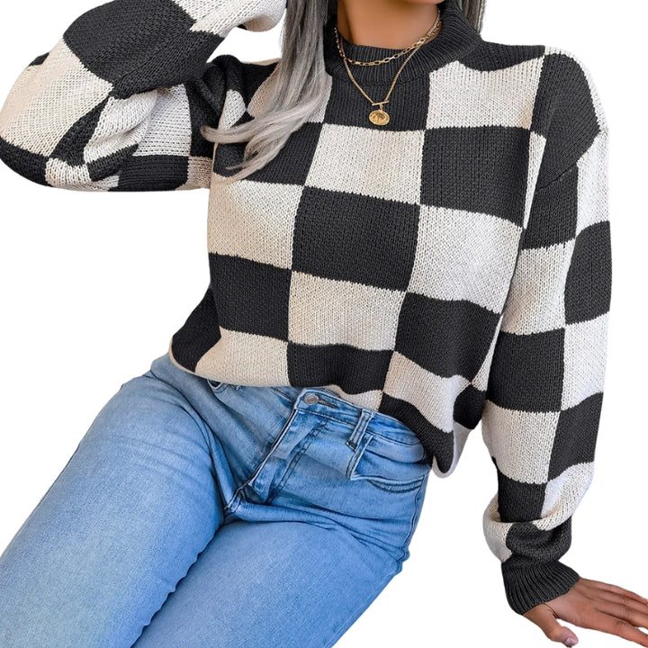 Dames trui met gebreid vierkantpatroon, ronde hals en geribbelde afwerking
