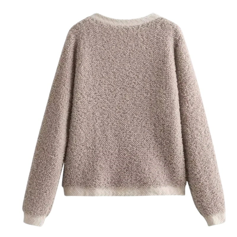 Damesvestje met knoopsluiting en bouclé oppervlak