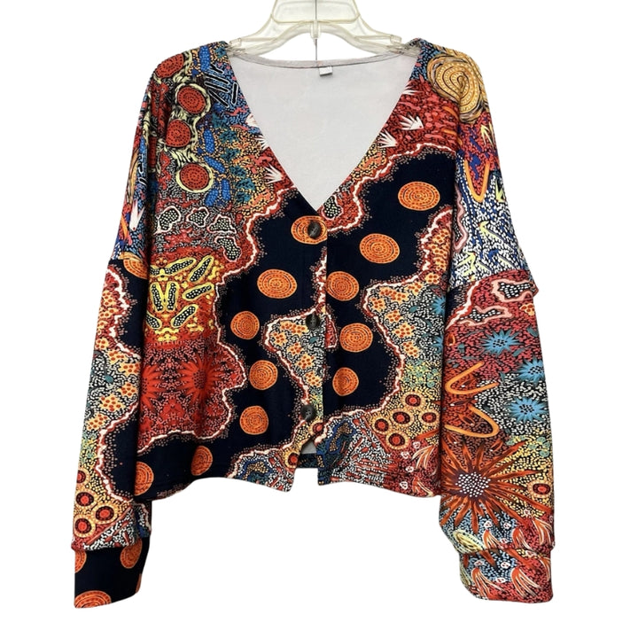 Damesvest met stippenmotief en ronde versieringen