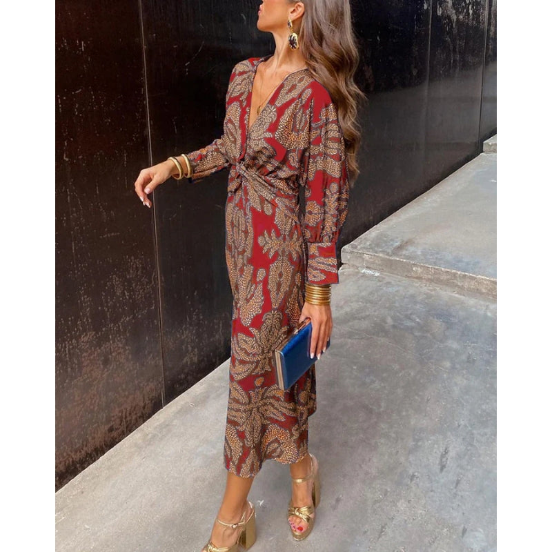 Midi jurk met diepe v-hals en gedrapeerde taille