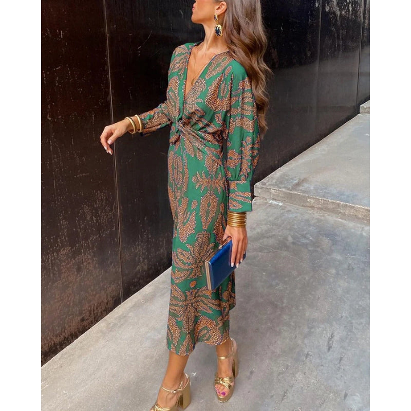 Midi jurk met diepe v-hals en gedrapeerde taille